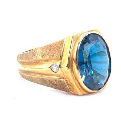 Mens 14k Gold Ring With Deep Blue Center Stone Accented By Diamonds.