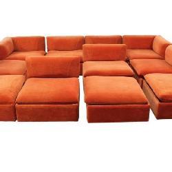 Lot 175: 11 piece vintage Mid Century Modern modular sofa, structurally sound and in good condition, with original desirable orange upholstery, cube style to make up your own setting! 