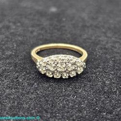 A 14k yellow Gold Estate Diamond Cluster Ring with 16 diamonds Size 6.5 and 3.5 grams TW.