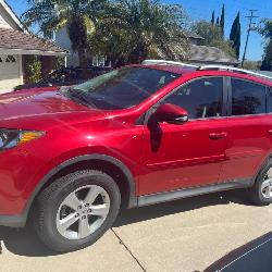 Up for Auction 2013 Toyota Rav4XLE 12,000 Miles